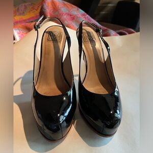 Black patent Pour La Victoire platform 6” slingback heels